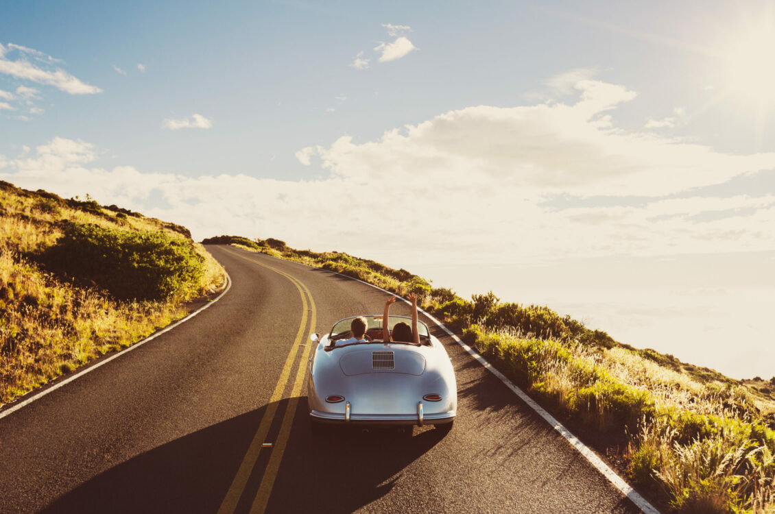 A convertible car on the road