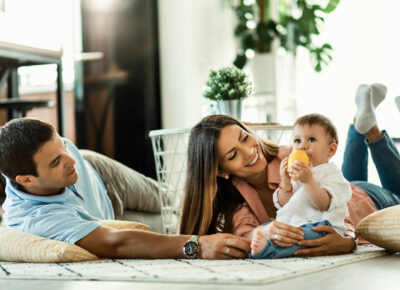 Couple enjoying time with a baby