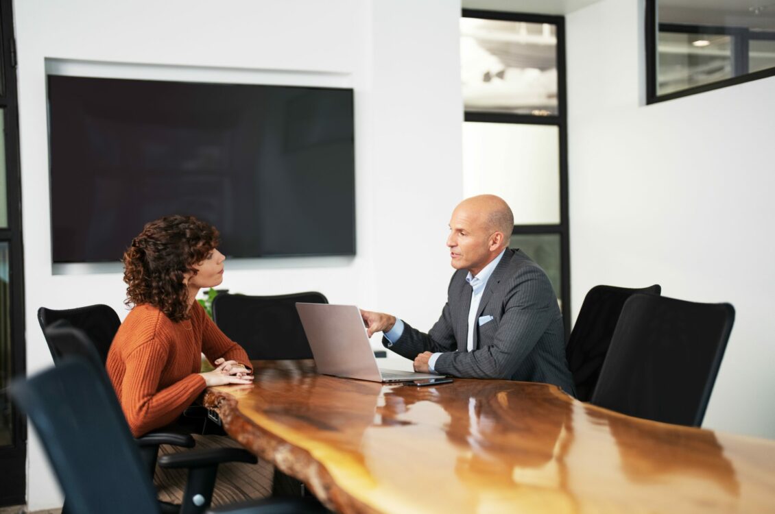 Two professionals in a meeting.