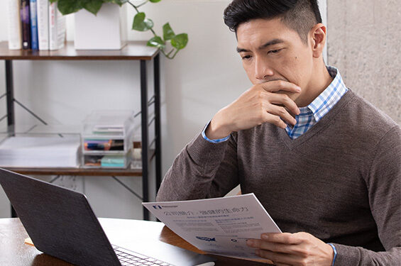 A man reading some papers.