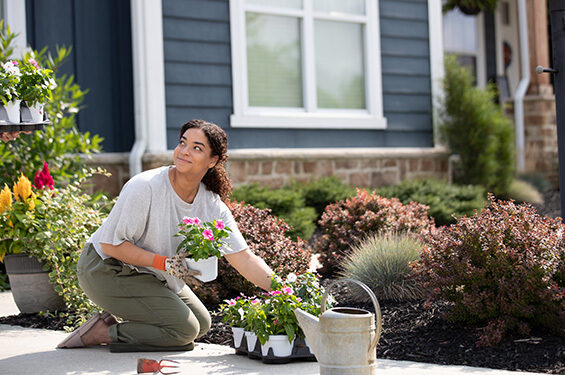 A person gardening happily.