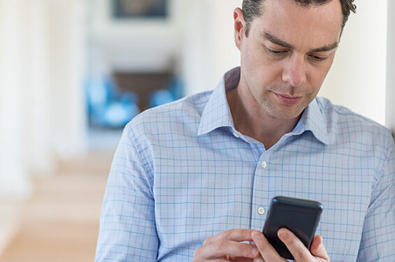 A person looking at their mobile device.