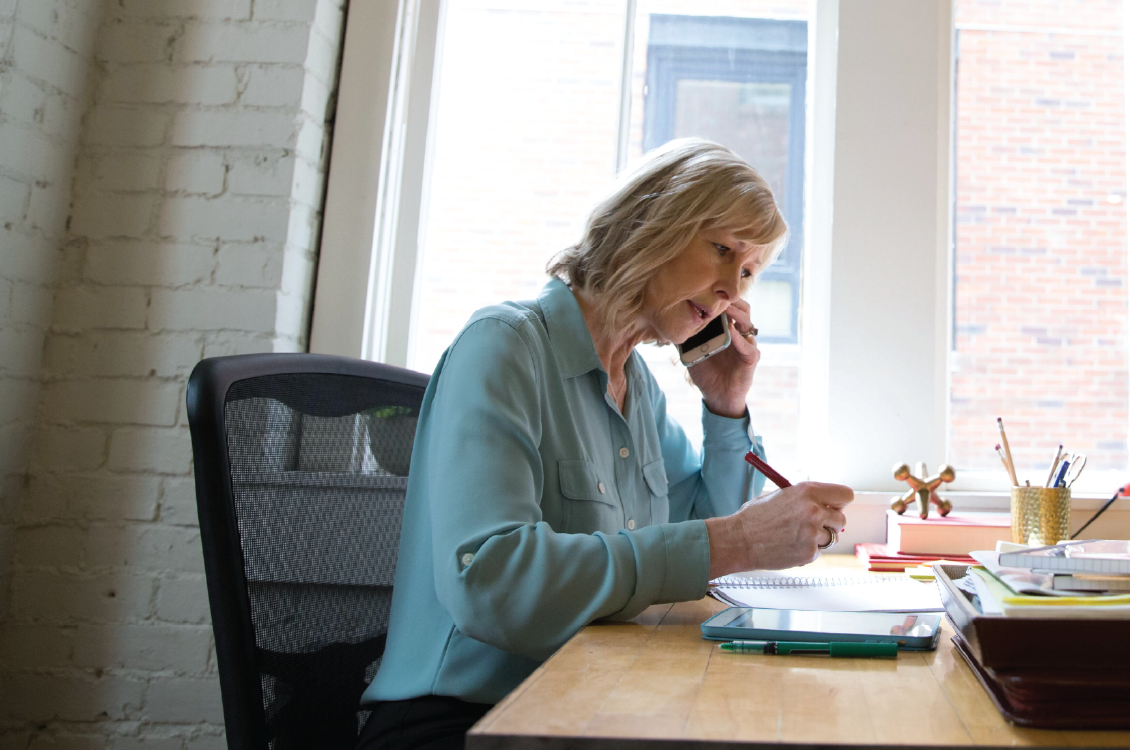 A woman talking on the phone.