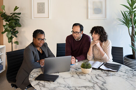 A group of people in a meeting.