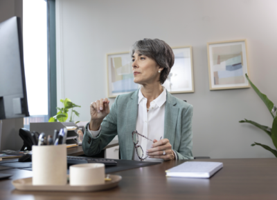 business woman sitting at desk